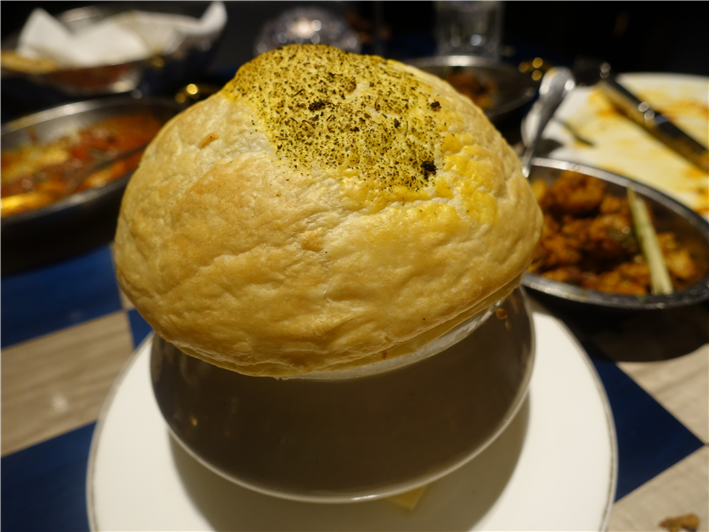 biryani with its pastry lid